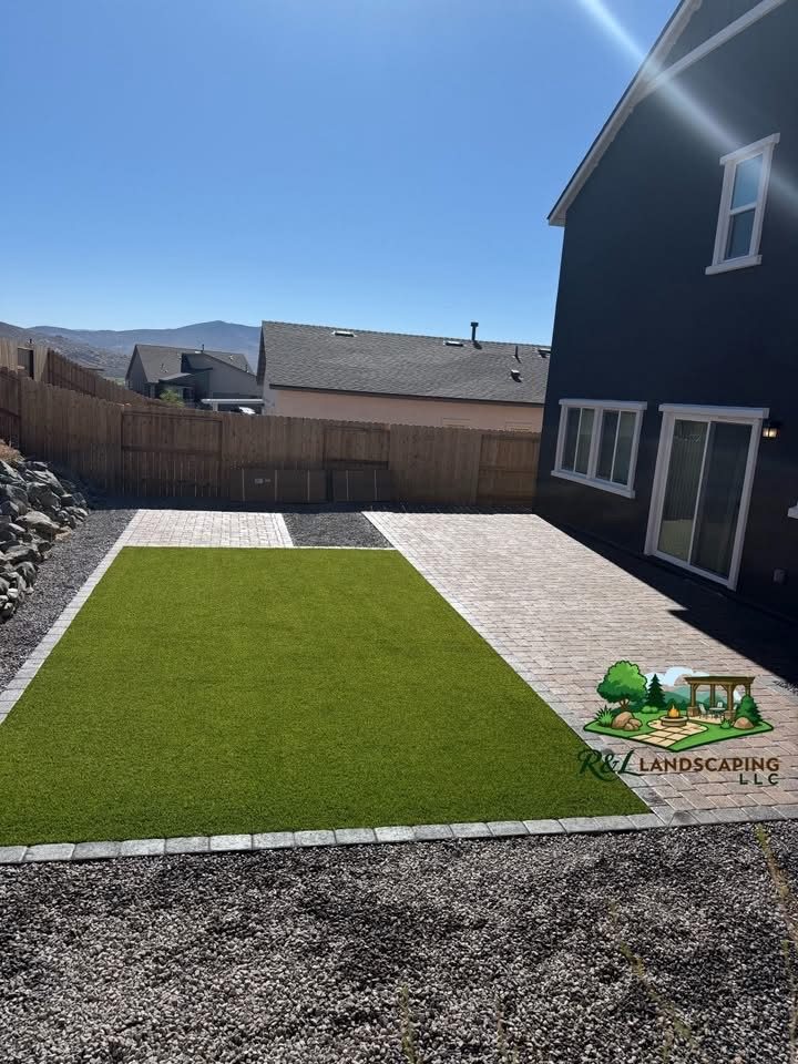 Same backyard after turf and paver patio installation by R&L Landscaping LLC